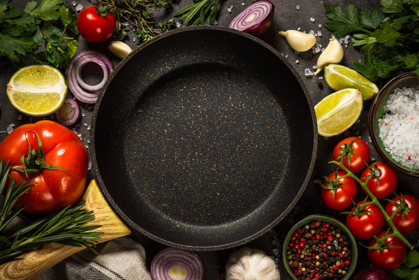 Ingredients for cooking at black table. - 写真・画像