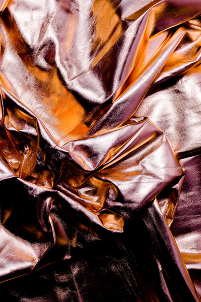 Fundo de folha de néon holográfico dourado brilhante. Multicolor pano de fundo da moda. Copyspace vista horizontal superior
 - Foto, Imagem