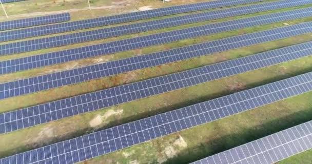 Solar panels aerial view. Solar panels from above fields. Renewable energy - Filmati, video