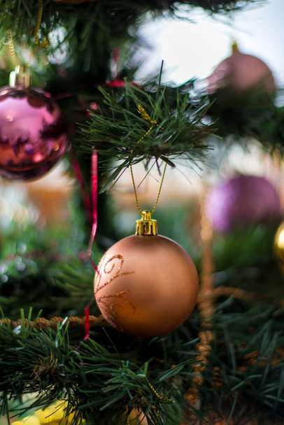 Decorations and toys on the New Year tree. - Zdjęcie, obraz