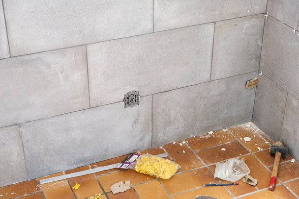 ceramic tile installation site with its tools - 写真・画像