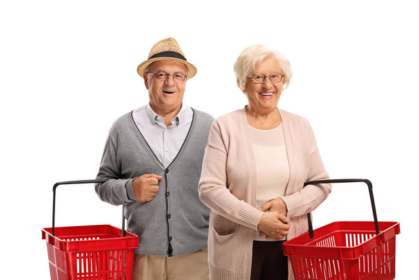 Elderly people with empty shopping baskets isolated on white background - Foto, Imagem
