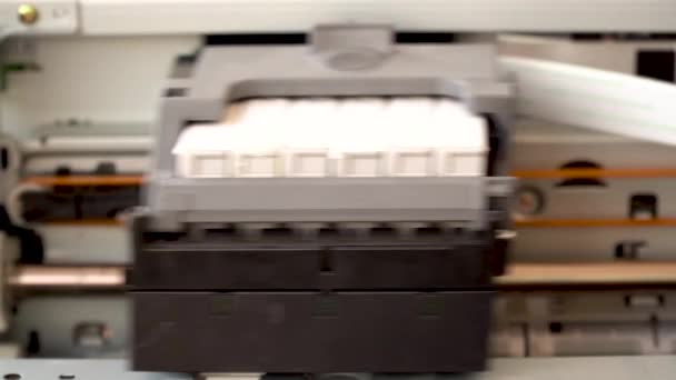 movement of the printhead of an inkjet printer - Footage, Video