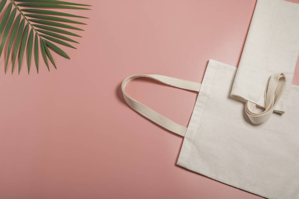 White tote bag canvas fabric. Cloth shopping sack mockup with copy space. - Fotografie, Obrázek