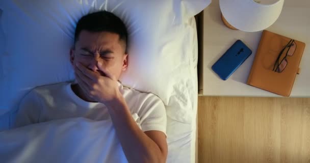 asian man has insomnia - 映像、動画