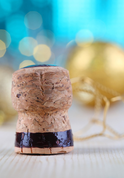 Champagne cork on Christmas lights background - Photo, Image