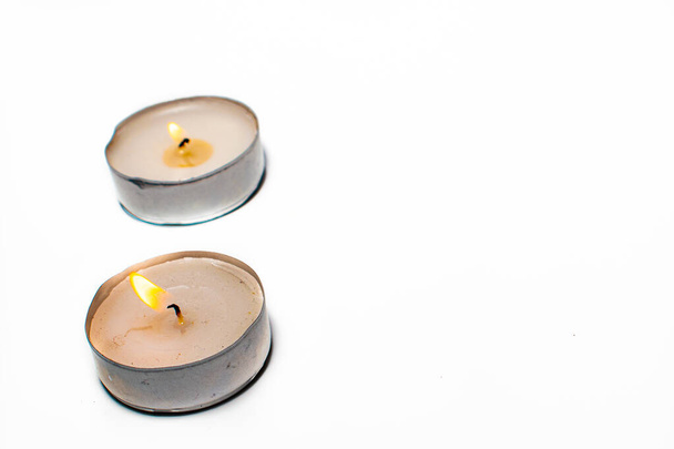 Burning grey candles on a white background - Photo, Image