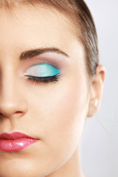 Woman eye with exotic style makeup - Foto, Imagen