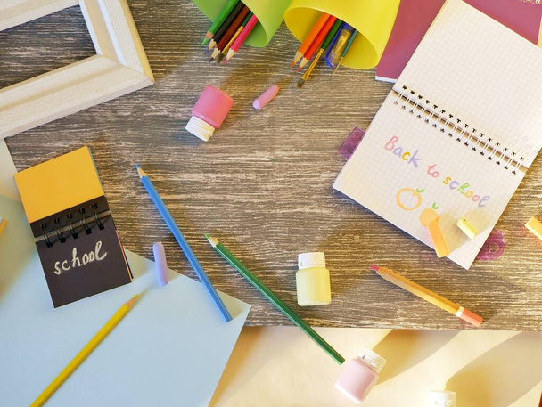 School stationery, on the desk, home schooling concept, part of the interior of a children's room, back to school - Photo, Image