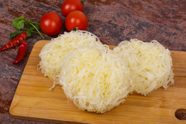 Raw rice noodle ready for cooking - Photo, Image