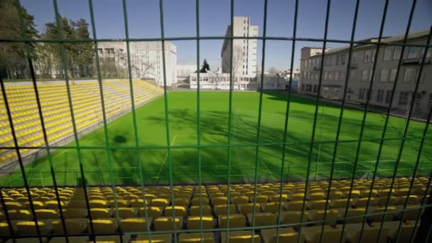 The stadium is fenced with an iron fence. World Cup and European Football Championship canceled. Cancellation of matches due to the coronavirus pandemic, quarantine. Access is closed. - Footage, Video