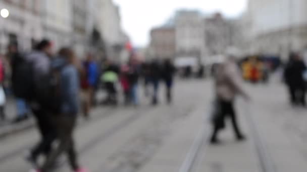 Resumen Desenfocado Borroso Fondo de muchas personas en la plaza de la calle - Imágenes, Vídeo