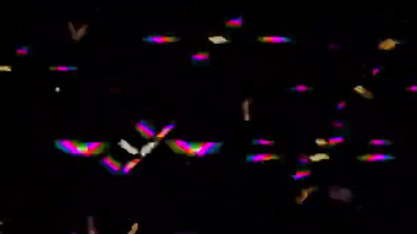 Golden confetti falling down. Multi-colored glitter. Rays, glare, glint, glow, rainbow. Realistic Golden Confetti. Luxury glittering particles.  New year, Christmas, party, birthday, concert.  - Footage, Video