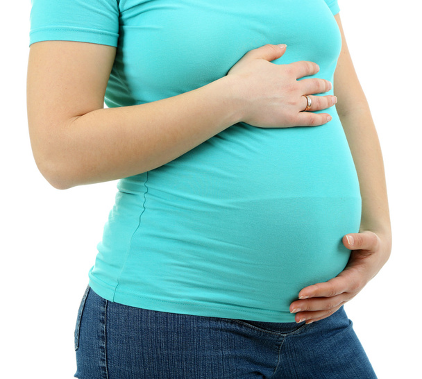 Pregnant woman touching her belly isolated on white - Φωτογραφία, εικόνα