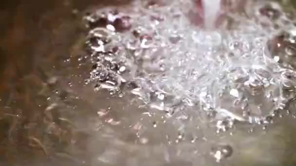 slow motion water pours with bubbles 120fps to 25 fps - Video