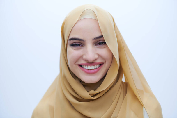 portrait of beautiful muslim woman in fashionable dress with hijab isolated on white background representing modern islam fashion and ramadan kareem concept - Photo, Image