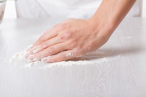 Hands and white wheat flour - Photo, image
