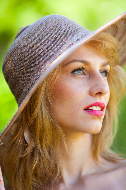 Beautiful blonde with hat outdoors - Zdjęcie, obraz