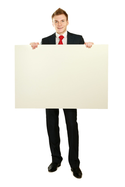 A business man with an empty blank, - Foto, imagen