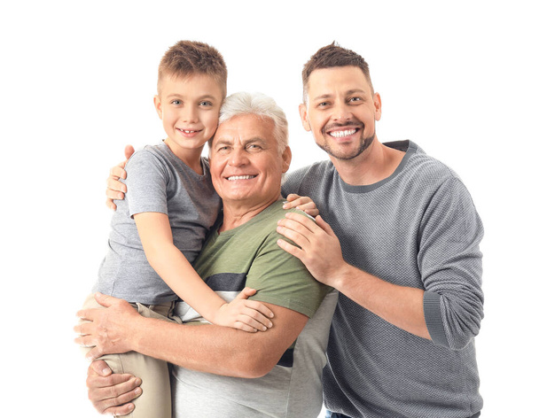 Uomo con il padre e il figlio su sfondo bianco
 - Foto, immagini