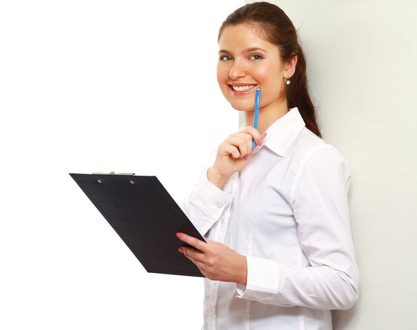 Portrait of the business woman with folder - Photo, image