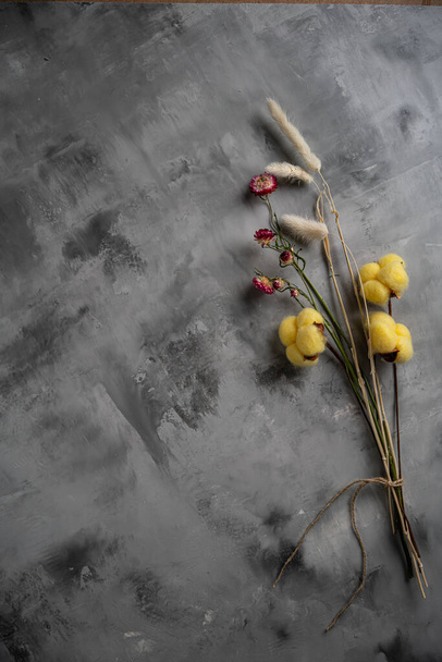 Cotton flower on grey background - Foto, imagen