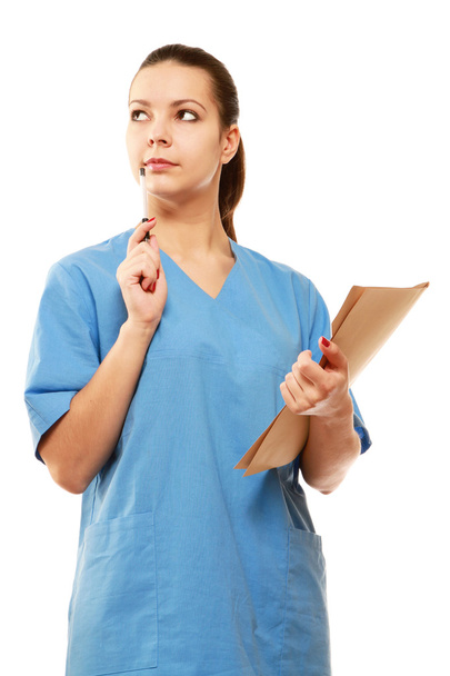 A female doctor with a folder - Φωτογραφία, εικόνα