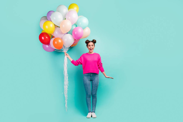 Full length body size view of nice attractive lovely cheerful cheery wavy-haired girl holding in hand air balls festal occasion isolated on bright vivid shine vibrant green blue color background - Fotó, kép