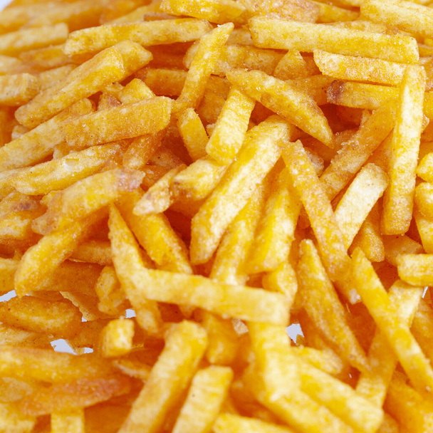 Pommes de terre frites savoureuses fraîches - fond de pied appétissant
 - Photo, image
