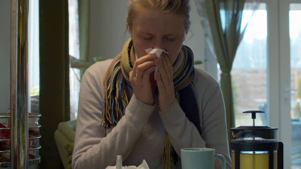 Young woman with a cold and stuffy nose - Photo, Image