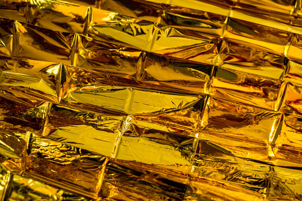 abstract Crumpled golden foil backgound - Photo, Image
