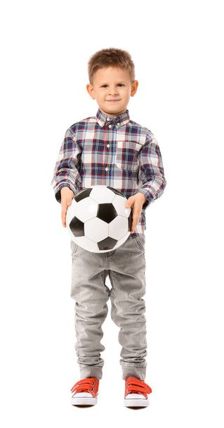 Cute little boy with soccer ball on white background - Фото, изображение