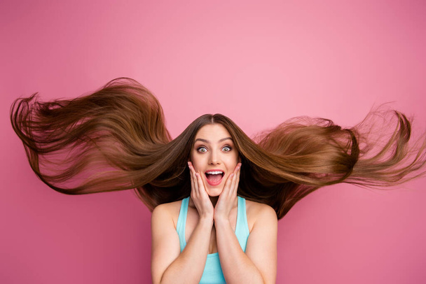 Close-up portrait of her she nice attractive lovely pretty amazed delighted cheerful cheery straight-haired girl ideal silky shine hair flying modern procedure isolated on pink pastel color background - Foto, Bild