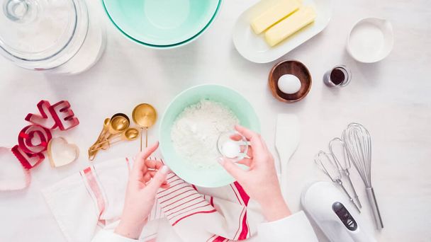 Flat lay. Step by step. Mixing sugar cookies dough in mixing bowl. - Foto, immagini