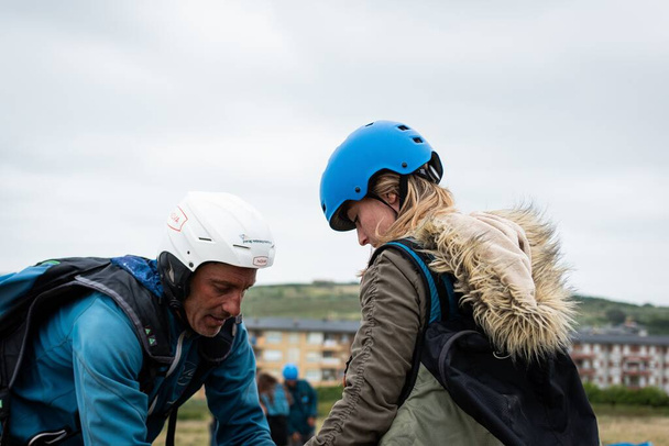 SOPELA, SPAIN - Aug 24, 2019: Preparation and safety for paragliding - Photo, image
