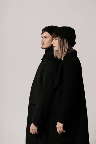 Millennial fashion couple on a white background in studio - Photo, image