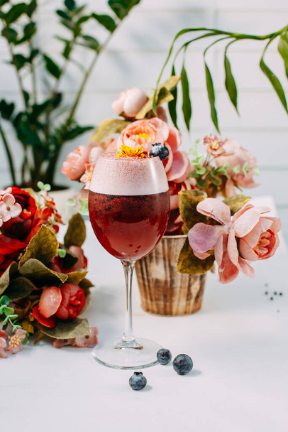 Beautifully decorated cocktail with a straw - Photo, Image