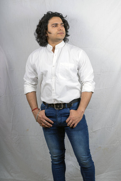 indian male model wearing white shirt side pose - Photo, Image