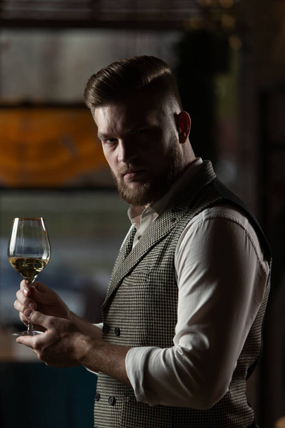  Sommelier guy with a glass of white wine - Fotoğraf, Görsel