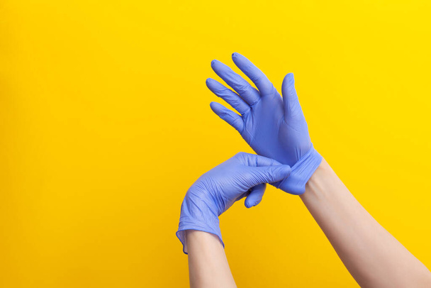Step-by-step instructions on how to remove dirty gloves, doctor take off from hand glove - Fotó, kép
