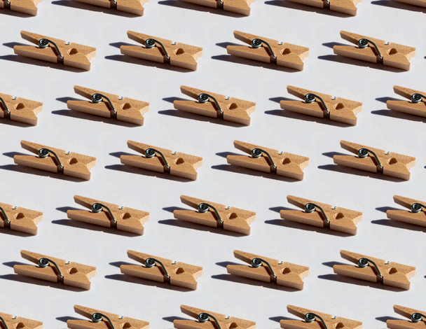 Seamless pattern with decorative wood clothespin with hard light - Фото, зображення