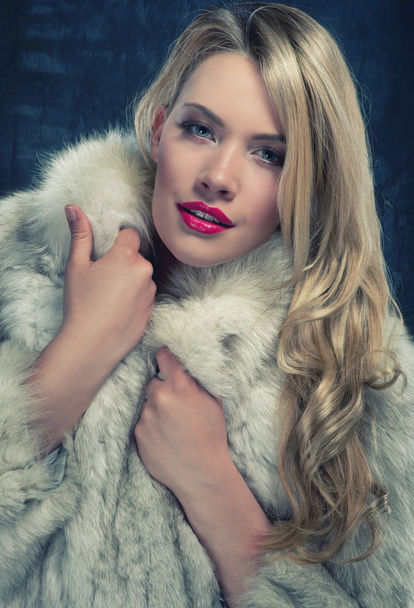 Pretty blonde woman in winter coat - Photo, Image