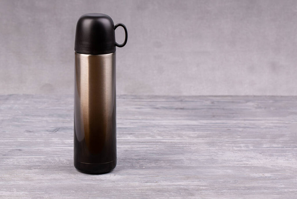Thermos for tea or coffee with mug - 写真・画像