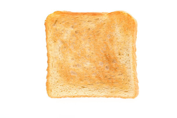 Φέτα φρυγανισμένου ψωμιού που απομονώνεται σε λευκό φόντο σε κοντινό πλάνο (υψηλές λεπτομέρειες) - Φωτογραφία, εικόνα