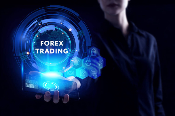 Business, Technology, Internet and network concept. Young businessman working on a virtual screen of the future and sees the inscription: Forex trading - Photo, Image