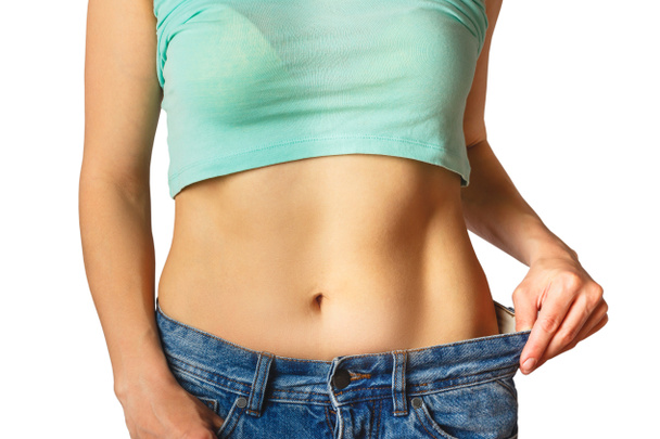 Schlanke schöne Frau trägt Jeans Großformat, Diät und Gesundheitskonzept - Foto, Bild