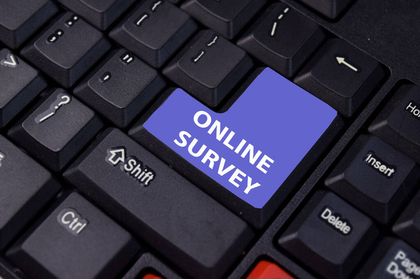 Online Survey isolated on laptop keyboard background. - Valokuva, kuva