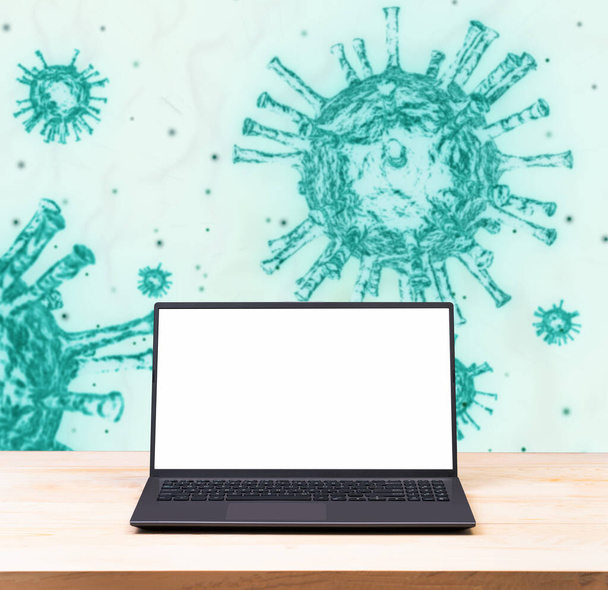 Computador portátil de tela branca em branco Mockup com imagem embaçada de 2019-ncov. Crise pandémica do coronavírus
 - Foto, Imagem