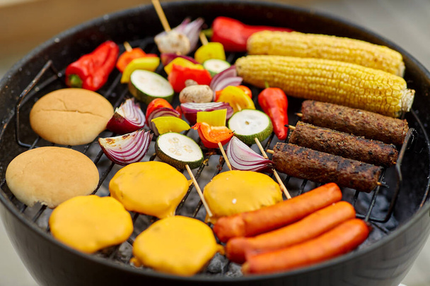 barbecue kebab meat and vegetables on grill - Fotoğraf, Görsel