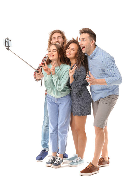 Friends taking selfie on white background - Photo, image